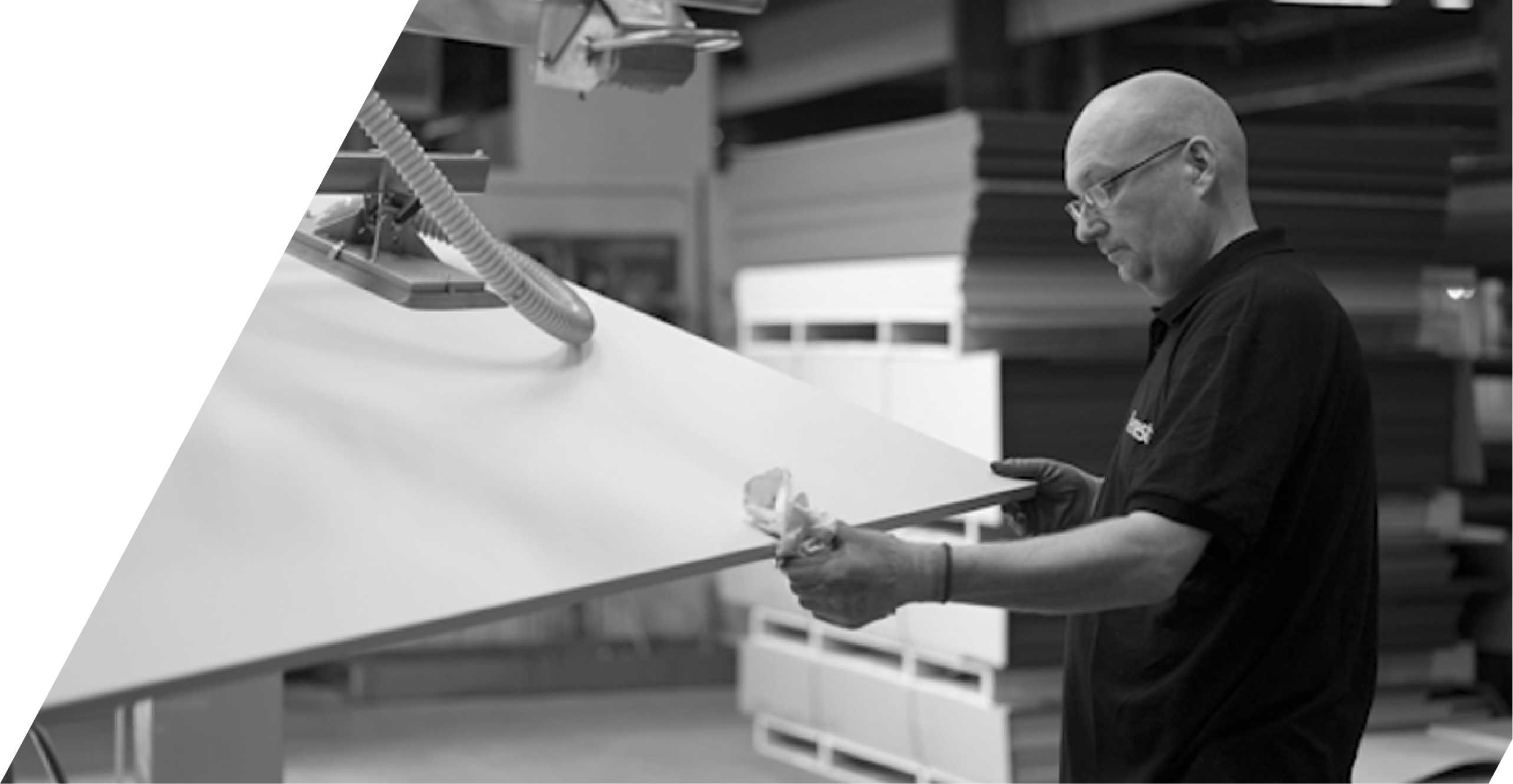Manufacturing specialist inspecting a solid surface panel