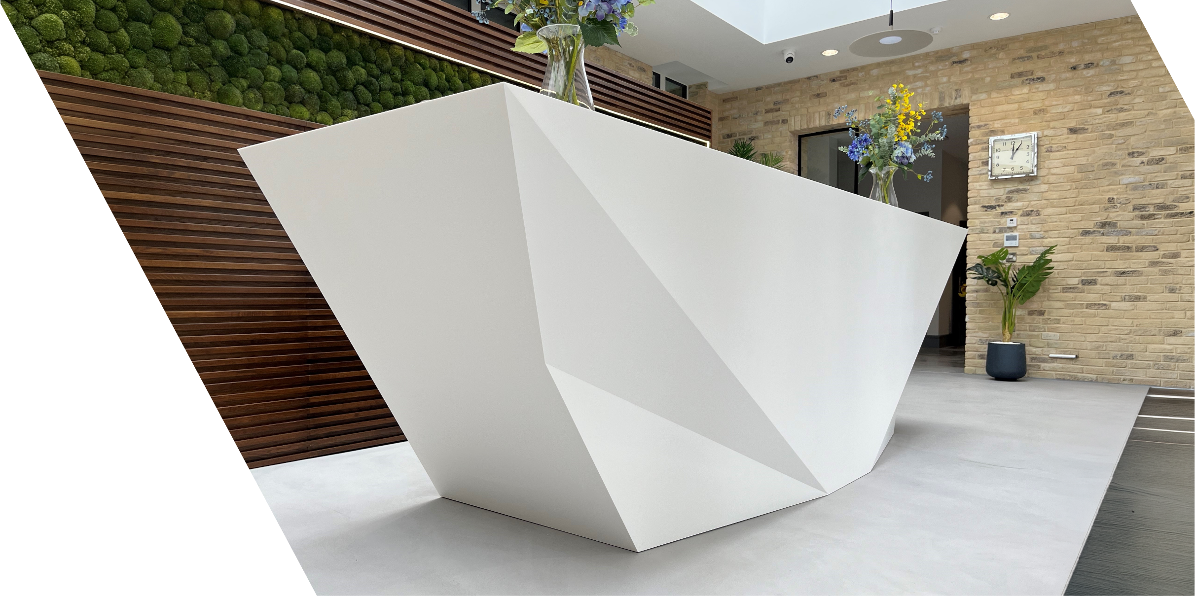Angular solid surface reception desk